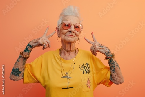 Old woman in bright t-shirt and sunglasses