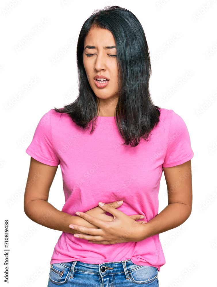 Fototapeta premium Beautiful asian young woman wearing casual pink t shirt with hand on stomach because nausea, painful disease feeling unwell. ache concept.