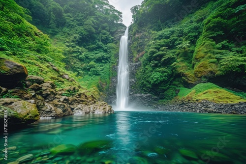 Waterfall in the green forest on the island of Maui, Hawaii