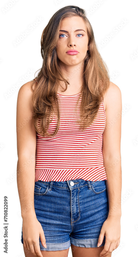 Beautiful caucasian young woman wearing casual clothes depressed and worry for distress, crying angry and afraid. sad expression. Beautiful caucasian young woman wearing casual clothes depressed and worry for distress, crying angry and afraid. sad expression.