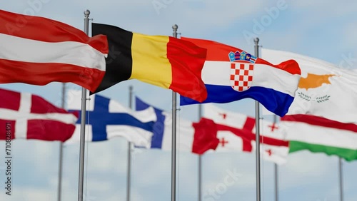 AER flags waving together on cloudy sky, endless seamless loop photo