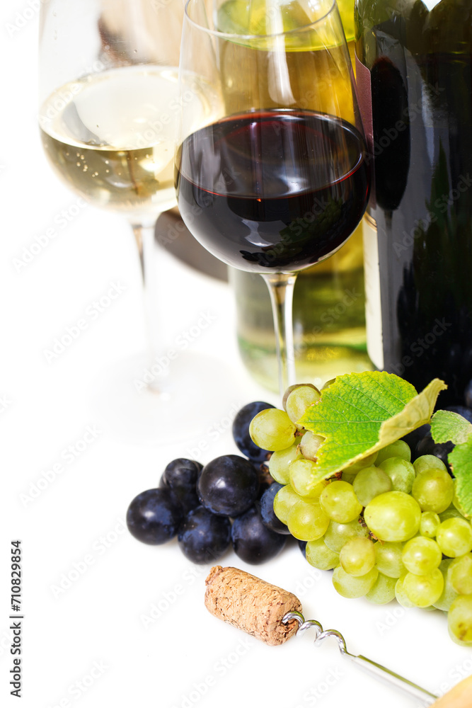 Glasses of white and rose wine and grapes over white
