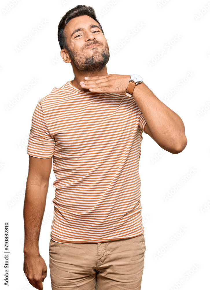 Handsome hispanic man wearing casual clothes cutting throat with hand as knife, threaten aggression with furious violence Handsome hispanic man wearing casual clothes cutting throat with hand as knife, threaten aggression with furious violence