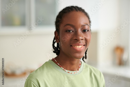 Portrait of happy Black girl with toothy smile