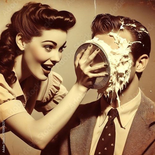Man gets pies in the face by atractive woman, vintage photo