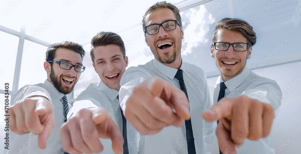 Fototapeta premium happy employees pointing at you