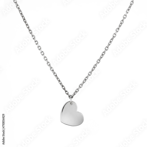 Female heart shaped pendant with silver chain necklace isolated on white background