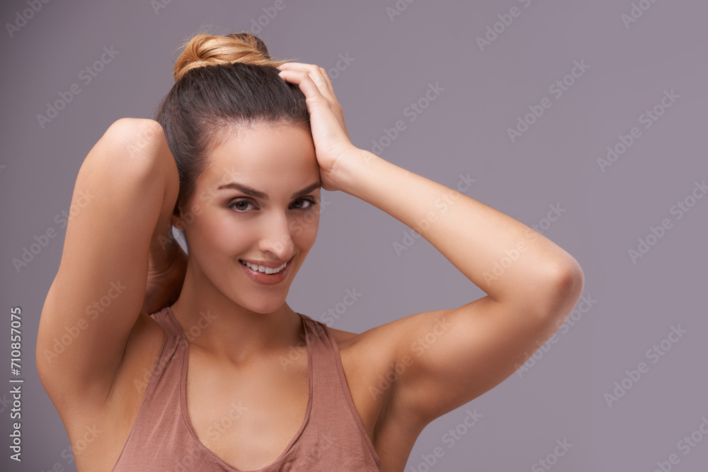 Portrait of happy woman, face or beauty for cosmetics or skincare dermatology for healthy glow. Isolated results, natural or confident model with smile or wellness in studio on purple background Portrait of happy woman, face or beauty for cosmetics or skincare dermatology for healthy glow. Isolated results, natural or confident model with smile or wellness in studio on purple background