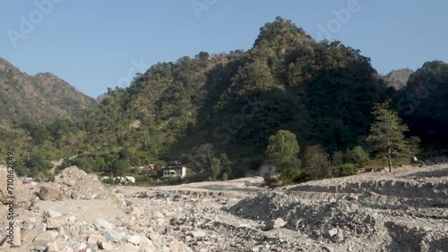 Monsoon Devastation: Flooded River Bank in Maldevta Village, Dehradun City, Uttarakhand, India. photo