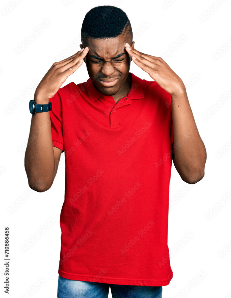 Young african american man wearing casual red t shirt with hand on head, headache because stress. suffering migraine. Young african american man wearing casual red t shirt with hand on head, headache because stress. suffering migraine.