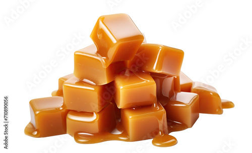 Stack of smooth, glossy caramel candies with rich, melted caramel sauce dripping down, cut out
