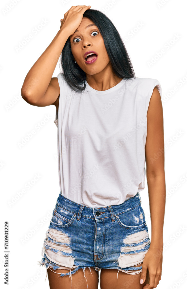 Young african american woman wearing casual clothes surprised with hand on head for mistake, remember error. forgot, bad memory concept. Young african american woman wearing casual clothes surprised with hand on head for mistake, remember error. forgot, bad memory concept.