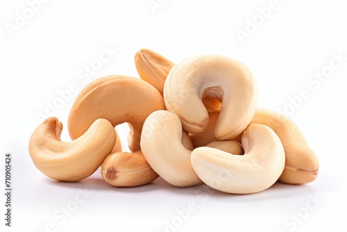 cashews. a bunch of peeled nuts on a white background. a healthy vegan product.