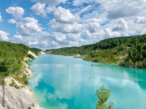 Azure, turquoise chalk lake on a bright sunny summer day