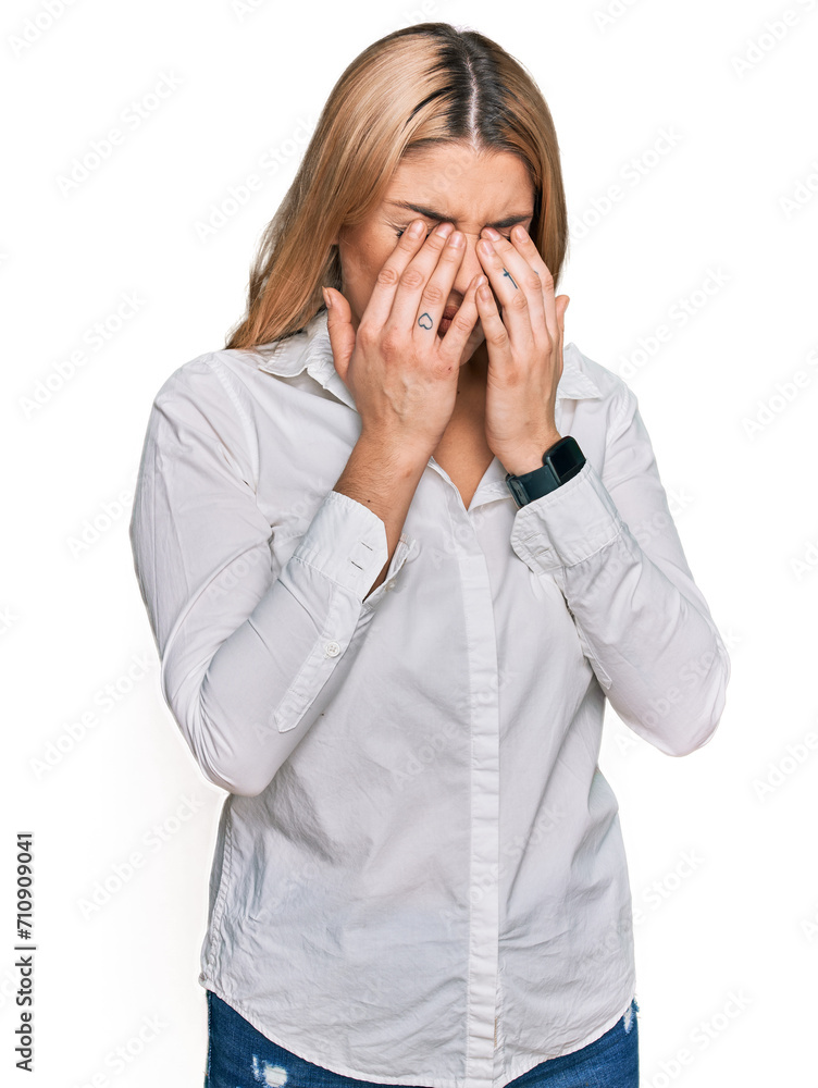 Young caucasian woman wearing casual clothes rubbing eyes for fatigue and headache, sleepy and tired expression. vision problem Young caucasian woman wearing casual clothes rubbing eyes for fatigue and headache, sleepy and tired expression. vision problem