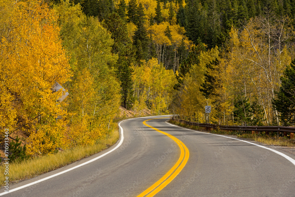 Autumn Mountain Road - A mountain road winding through a colorful Autumn forest. Mount Blue Sky Scenic Byway, Idaho Springs, Colorado, USA. Autumn Mountain Road - A mountain road winding through a colorful Autumn forest. Mount Blue Sky Scenic Byway, Idaho Springs, Colorado, USA.