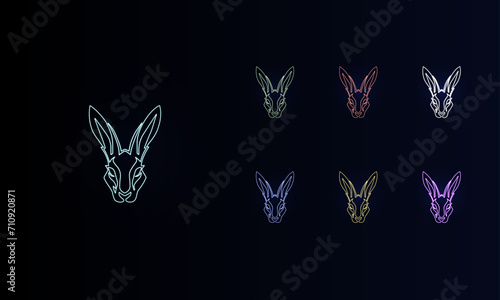 A set of neon hare's head symbols. Set of different color symbols, faint neon glow. Vector illustration on black background