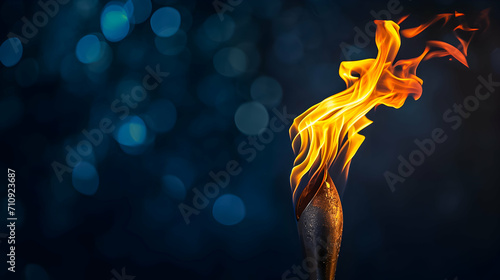 Background with olympic games torch with flame. Copy space. photo