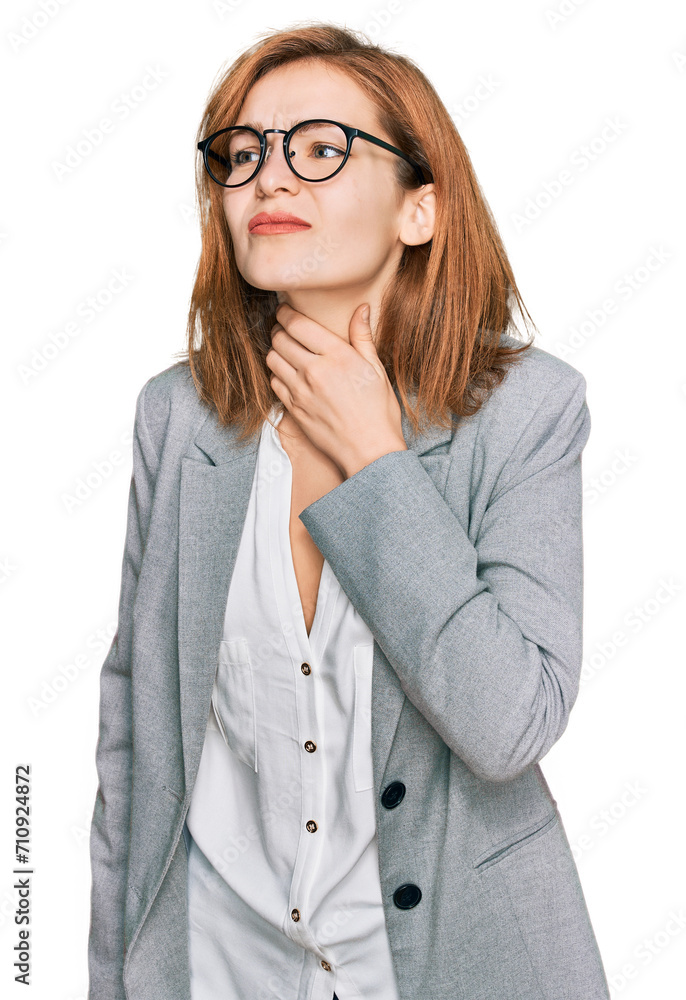 Young caucasian woman wearing business style and glasses touching painful neck, sore throat for flu, clod and infection Young caucasian woman wearing business style and glasses touching painful neck, sore throat for flu, clod and infection