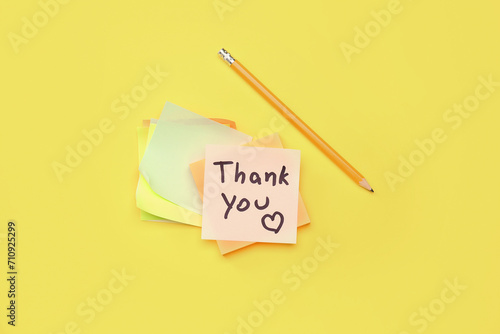 Sticky note with text THANK...