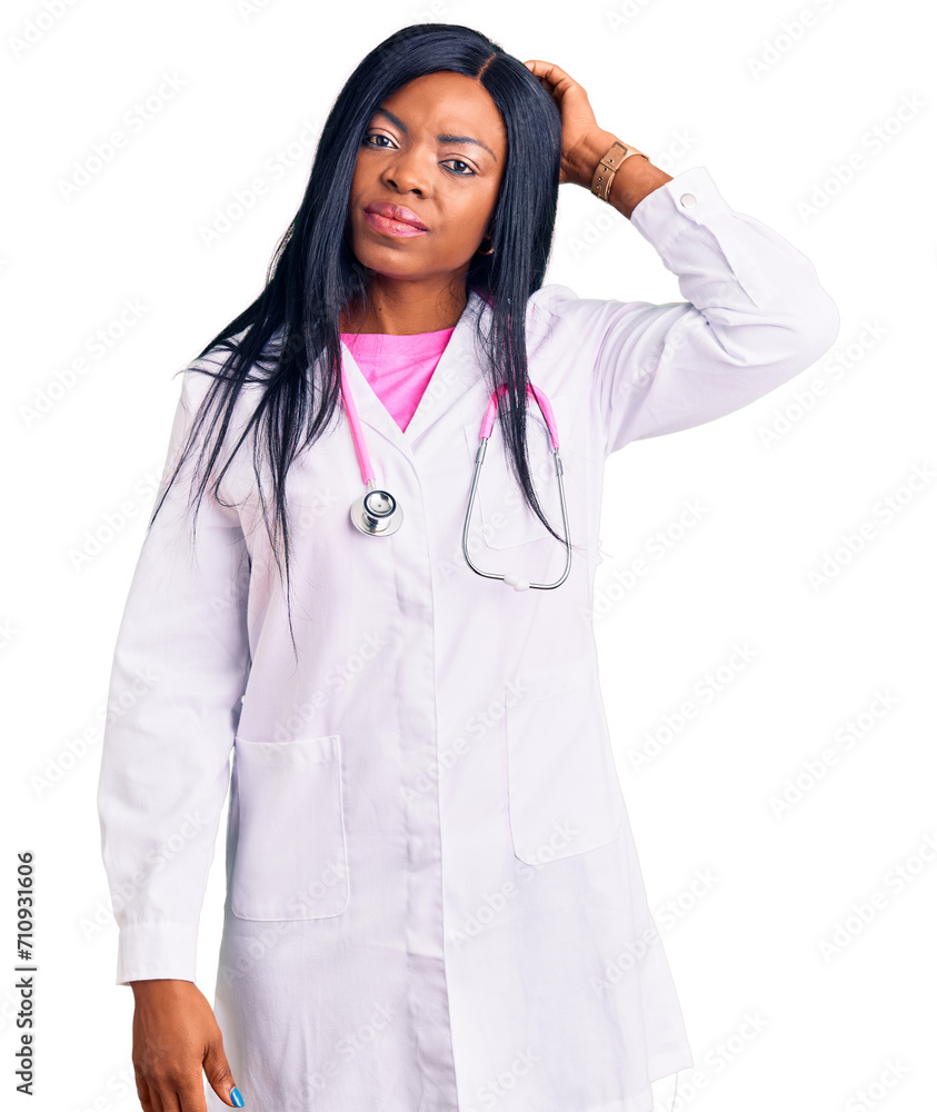 Young african american woman wearing doctor stethoscope confuse and wondering about question. uncertain with doubt, thinking with hand on head. pensive concept. Young african american woman wearing doctor stethoscope confuse and wondering about question. uncertain with doubt, thinking with hand on head. pensive concept.