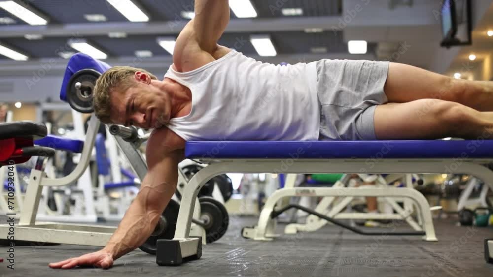 bodybuilder workouts exercise with dumbbell lying on bench bodybuilder workouts exercise with dumbbell lying on bench