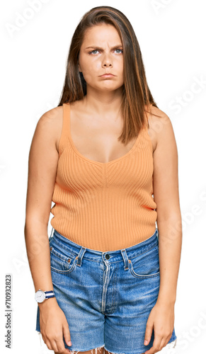 Young caucasian woman wearing casual clothes skeptic and nervous, frowning upset because of problem. negative person.