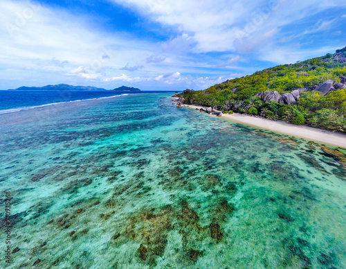 Aerial view of Anse Source d Argent beach coral reef