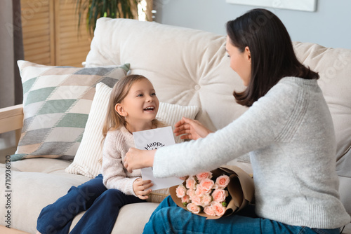 Happy little girl receiving...
