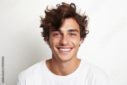 Young smiling man on white background