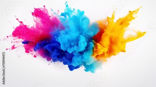 A white background is the backdrop for an explosion of colored powder.