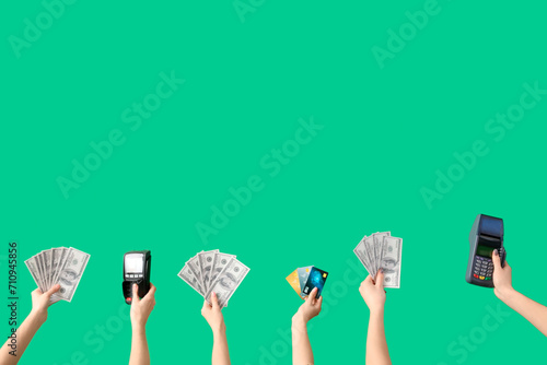 Women with credit cards, payment terminals and dollar banknotes on green background