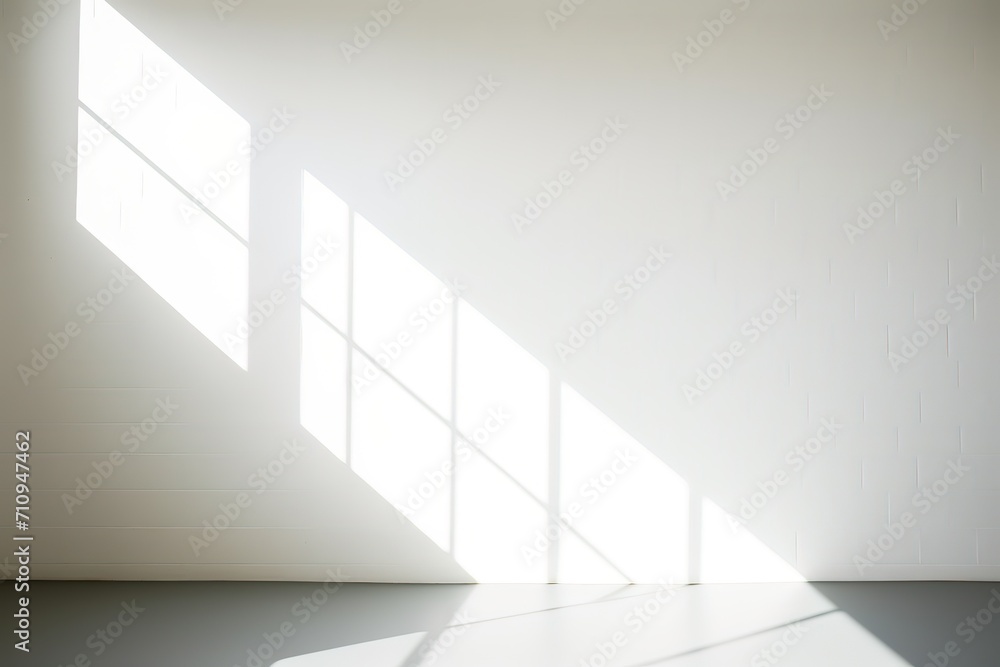Fototapeta premium Abstract white studio background for product presentation. Empty room with shadows of window. Display product with blurred backdrop. 