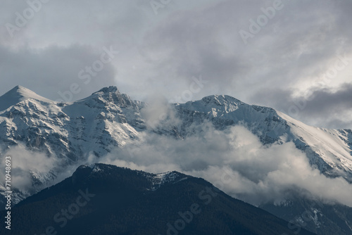 Snow covered mountain Olympus in Greece photo