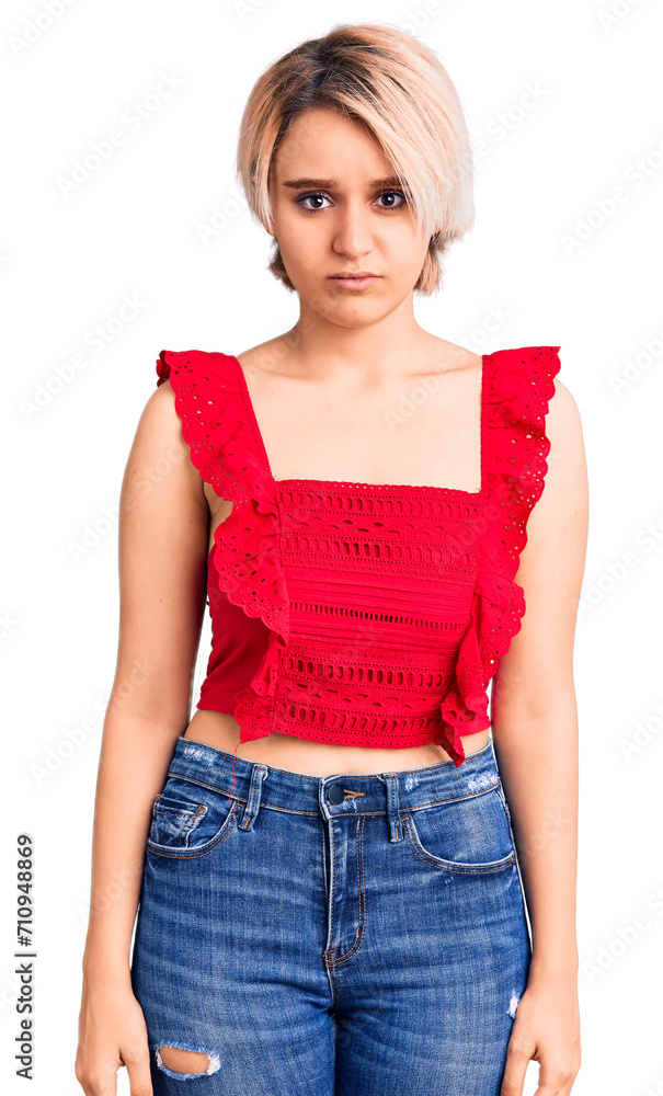 Young beautiful blonde woman wearing casual clothes depressed and worry for distress, crying angry and afraid. sad expression. Young beautiful blonde woman wearing casual clothes depressed and worry for distress, crying angry and afraid. sad expression.