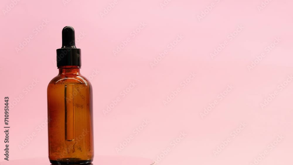 A transparent bubble on a pink background rotates A transparent bubble on a pink background rotates