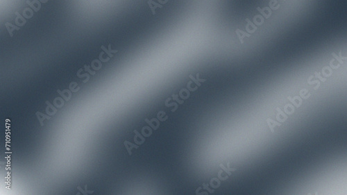 Abstract grey gradient blurred grainy textured background