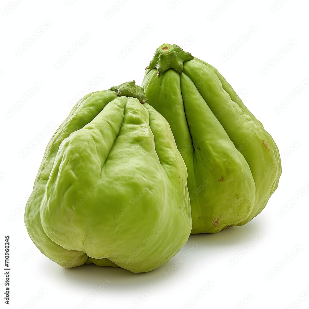 Fresh chayote fruit isolated on a white background. Fresh chayote fruit isolated on a white background.
