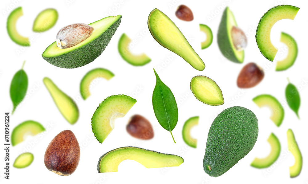 Falling avocados with green leaves isolated on a white background. Collection whole and half avocados. Falling avocados with green leaves isolated on a white background. Collection whole and half avocados.