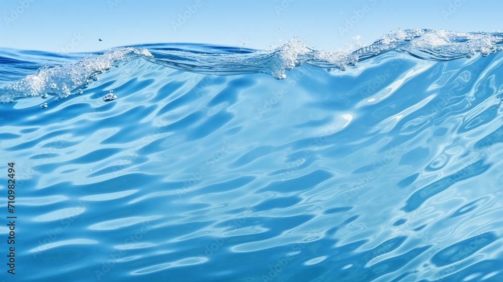 The surface of the water is transparent and features ripples, waves, and splashes. the background has space for copying. The surface of the water is transparent and features ripples, waves, and splashes. the background has space for copying.