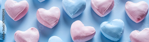 Wallpaper Mural Valentines day, Valentine's day love wedding concept banner greeting card template - Fallen soft pastel pink and blue hearts, isolated on blue paper table background texture, top view Torontodigital.ca