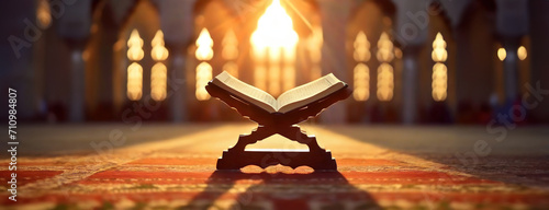 Sacred Book Opened on a Stand with Sunlight Streaming Through Windows. An open holy Quran basks in the golden sunlight, divine glow on its pages, peaceful reverence in a place of worship. Panorama.