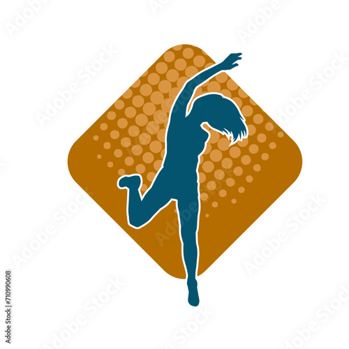 Silhouette of a female dancer in action pose. Silhouette of a woman dancing happily.