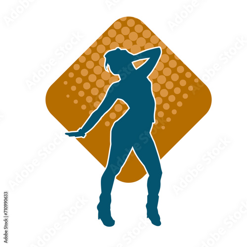 Silhouette of a female dancer in action pose. Silhouette of a woman dancing happily.