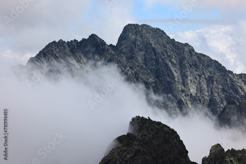 Kon  ist   is a beautyfull mountain in the Tatra Mountains  Slovakia. Excellent view of the peak in the clouds in summer. 