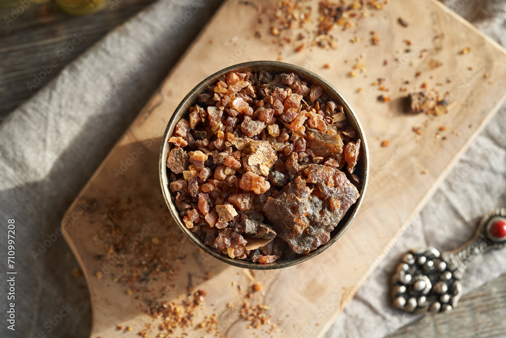 custom made wallpaper toronto digitalMyrrh resin in a bowl on a table - ingredient for essential oils