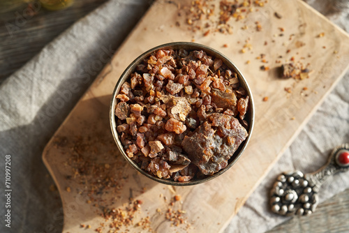 Wallpaper Mural Myrrh resin in a bowl on a table - ingredient for essential oils Torontodigital.ca