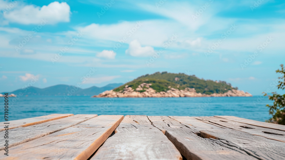Fototapeta premium Wooden table on the background of the sea, island, king of the forest and blue sky. Display. Wooden exhibition. Forest, snow, sea, sun. high quality photo.