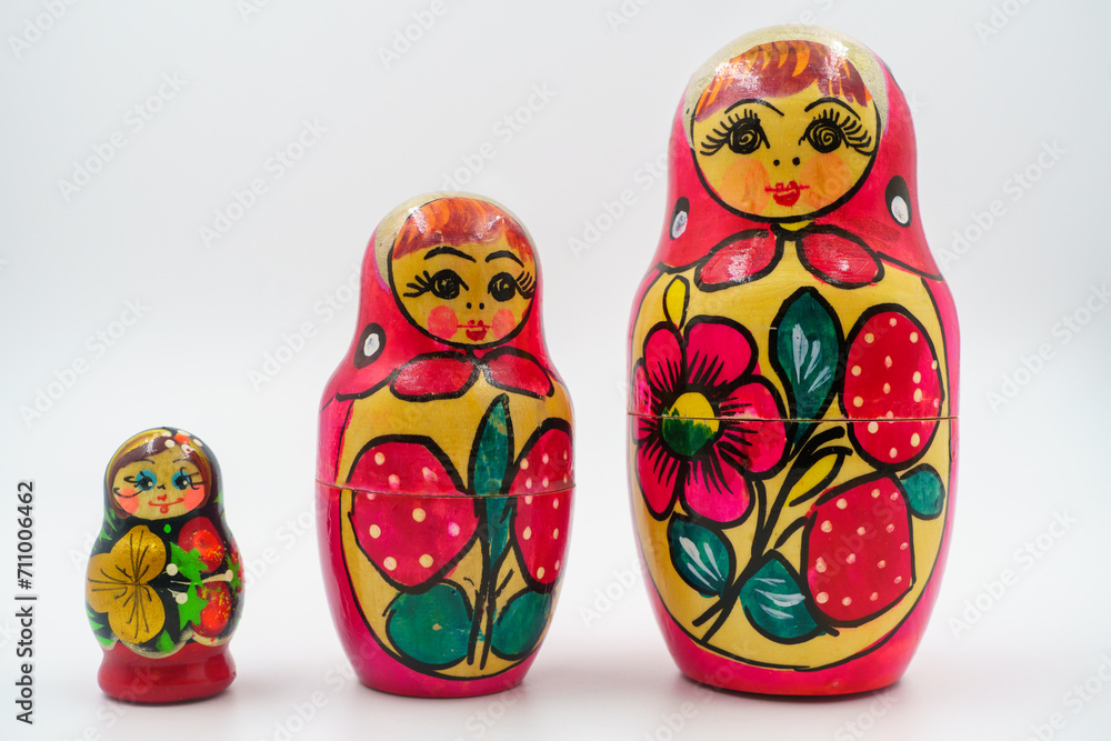 Nesting dolls, wooden traditional Russian matryoshka. Hand-painted, floral folk pattern. handicraft, craftsmanship Nesting dolls, wooden traditional Russian matryoshka. Hand-painted, floral folk pattern. handicraft, craftsmanship