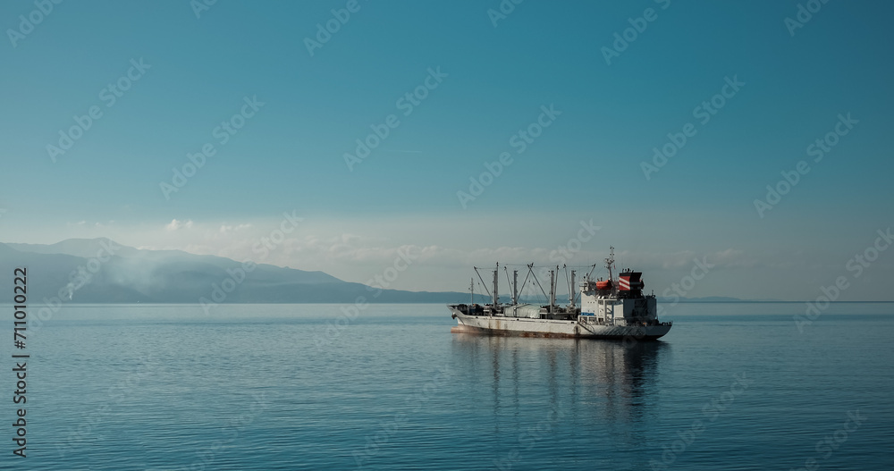 Large commercial fishing vessel in the sea. Big fishing ship in the sea in the coast of Albania. Deep sea fishing